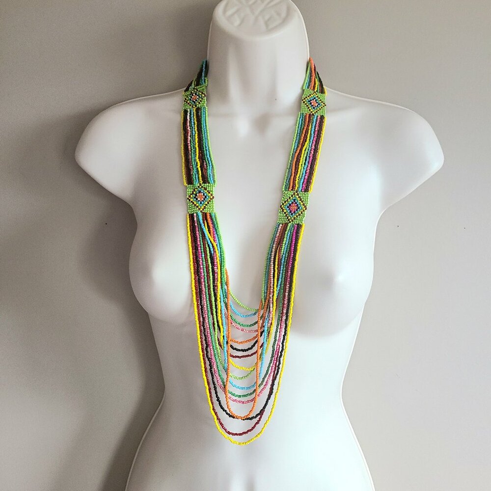 Handmade seed beads long multicolored multistring necklace.